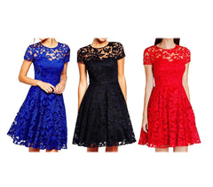 Robe dentelle manches courtes mod Cecille bouton sur le dos. Légèrement évasée