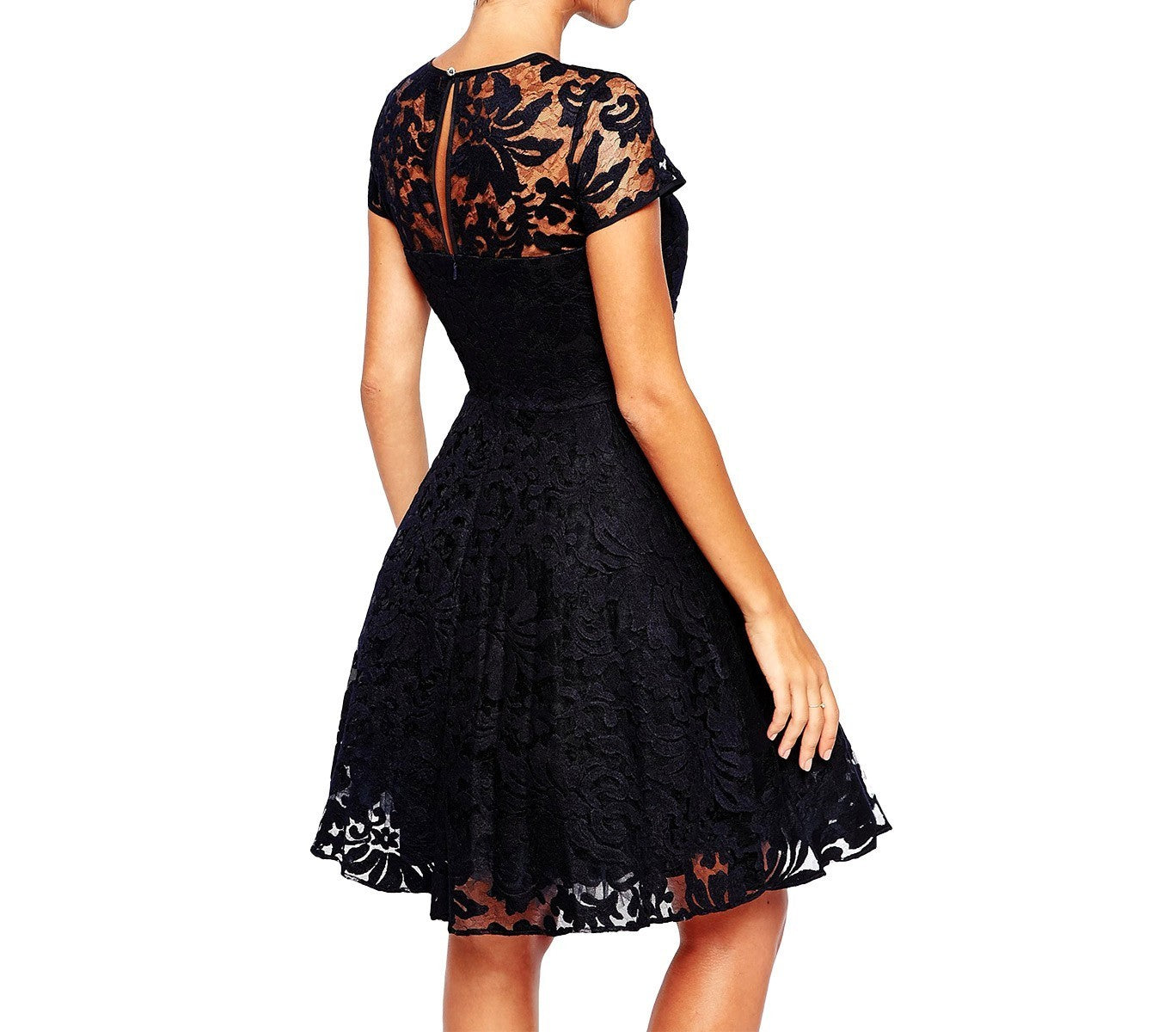 Robe dentelle manches courtes mod Cecille bouton sur le dos. Légèrement évasée