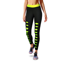 Leggings de sport KZ-311 pour les femmes avec des déchirure et des détails fluo 