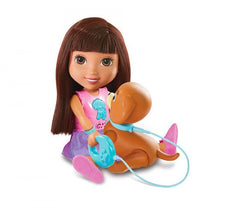 072587 La poupée Dora TRAIN & PLAY parle et chante avec son chien  FISHER PRICE