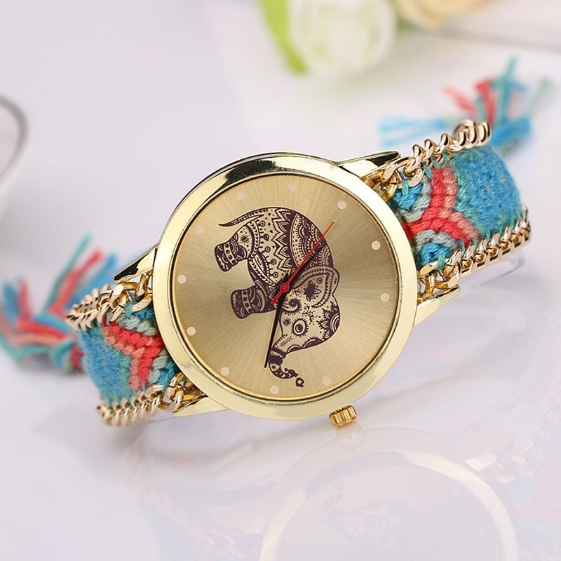 Montre ethnique/ dessin éléphant / Face et bords dorés MOD SUMMER