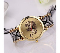 Montre ethnique/ dessin éléphant / Face et bords dorés MOD SUMMER