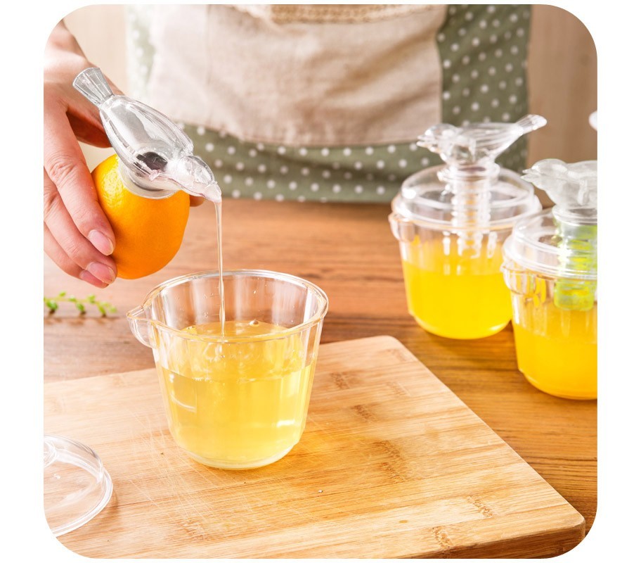 704639 - presse jus - squeezer-agrumes manuel avec applicateur - forme oiseau