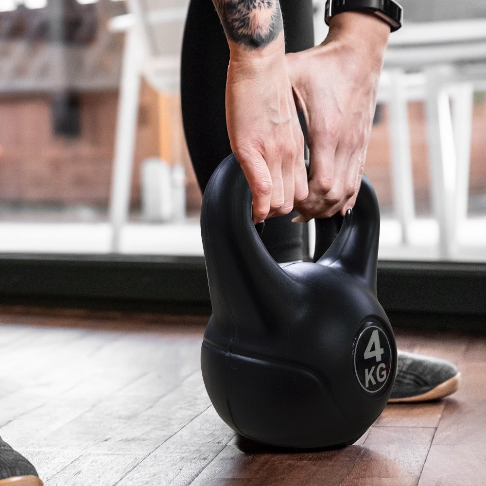 Kettlebell fitness 4kg en pvc 186946 avec sable et poignée anti-frottement