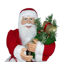 Père Noël assis sur la chaise 90cm 144059 avec sac cadeaux et sons de décoration