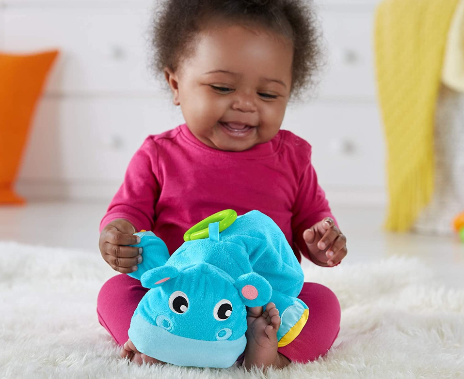 Hippopotame en peluche Fisher Price avec tissu doux et sons amusants