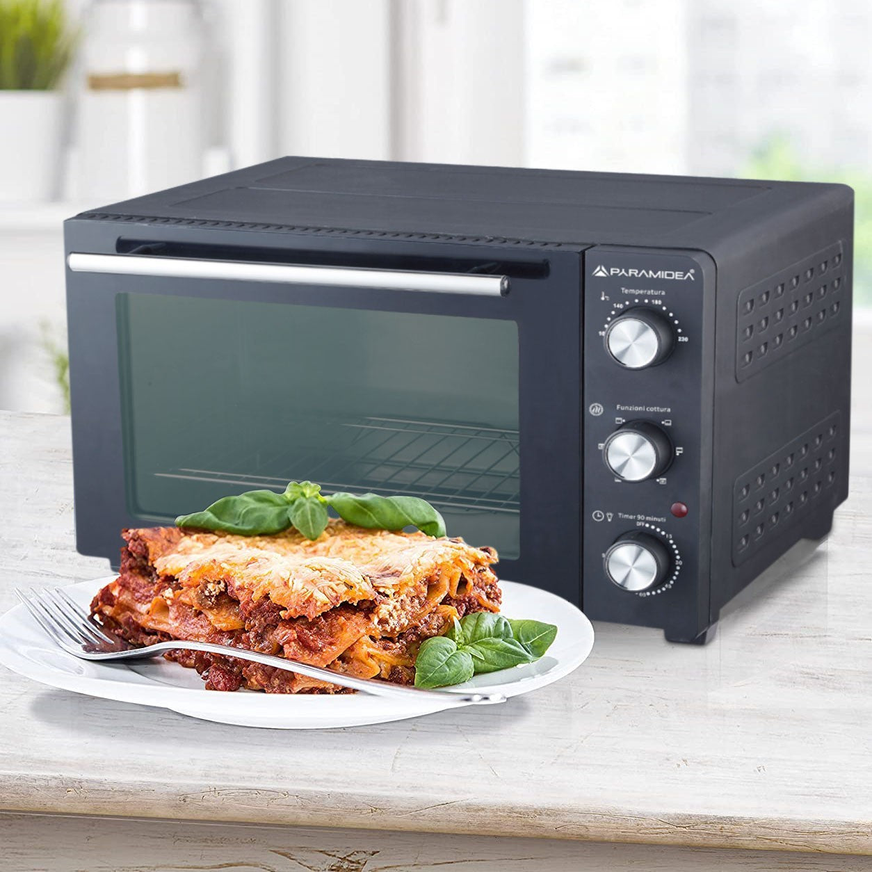 Four électrique ventilé 36L puissance 1500W avec plaque à pâtisserie incluse