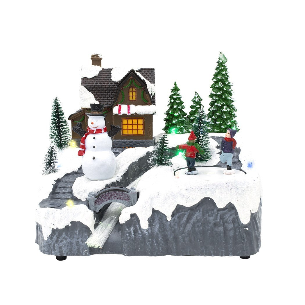 Scène de Noël enneigée carrousel musique lumières mouvement ruisseau