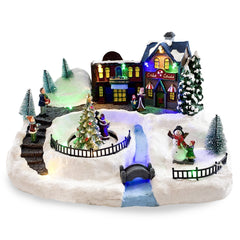 Village de Noel enneigé Carrousel Lumières Sons Mouvement 37x21x27cm