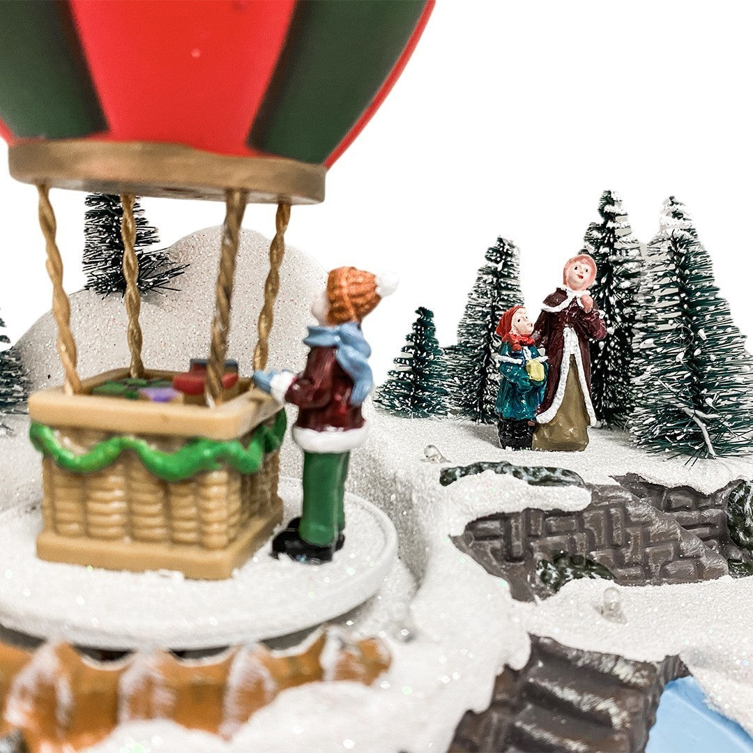 361014 Carrousel de Noël Montgolfière Carousel Lumières Sons 18x12x20cm