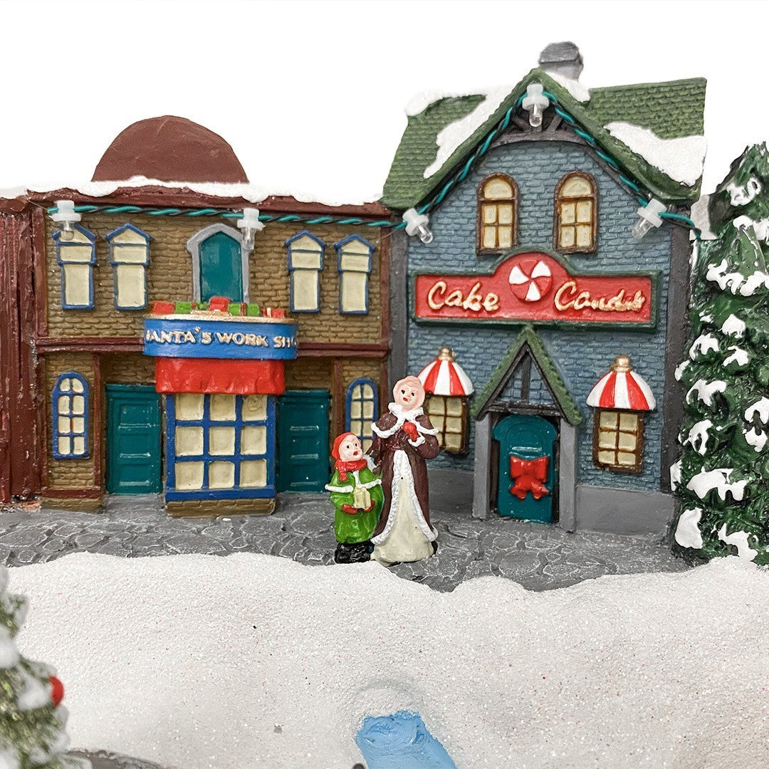 361039 Carousel Christmas Village Snow, Lights, Sounds and Movement 37x21x27