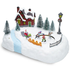 361040 Carrousel de Noël patinoire avec lumières, sons et mouvements 20x20x16 cm