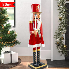 392028 Décoration de Noël Casse-Noisette soldat avec robe rouge et épée 80 cm