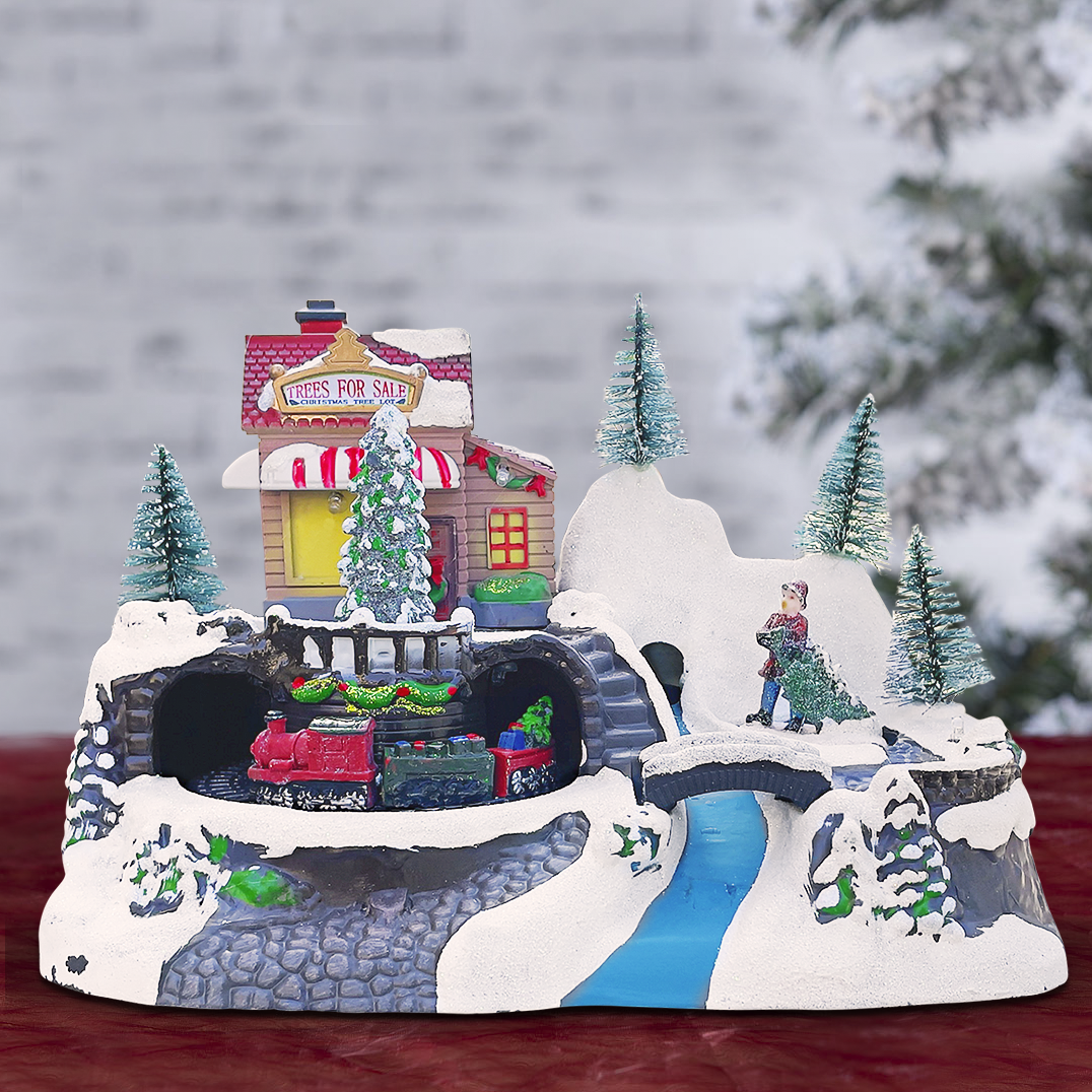 243012 Carrousel de Noël - Train avec lumières, sons et mouvements 24x16x17 cm