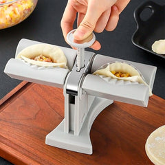 Machine à usage domestique de moule de boulettes de ravioli à double extrémité