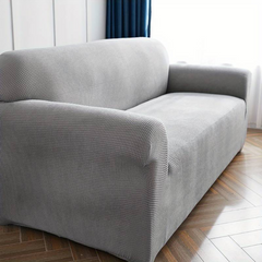 Housse de canapé 4 places avec élastique, unie, anti-taches, en tissu piqué